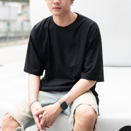 Men model with Oversized Black T-shirt.
