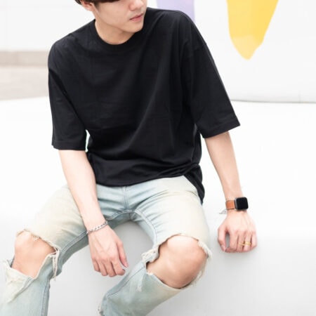 Men model with Oversized Black T-shirt.