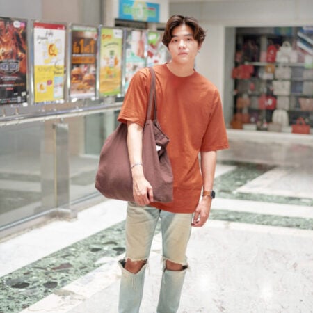 Men model with Oversized Brick Orange T-shirt.