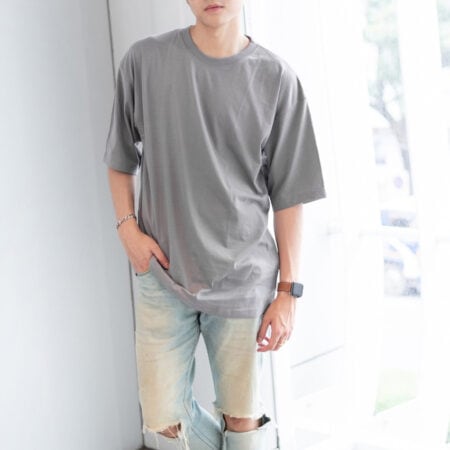 Men model with Oversized Grey T-shirt.