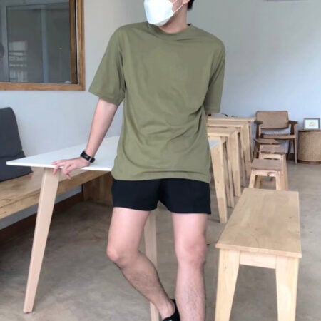 Men model with Oversized Olive T-shirt.