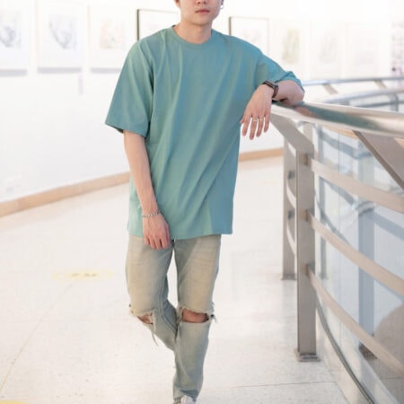 Men model with Oversized Pastel Green T-shirt.
